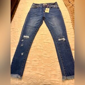 Distressed Blue Jeans